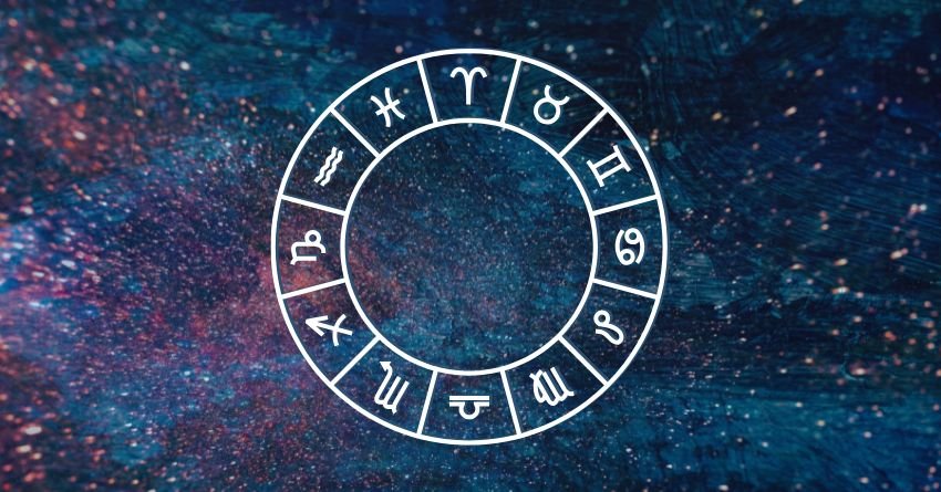 Glowing blue zodiac wheel surrounded by purple, pink, and dark blue cosmic clouds