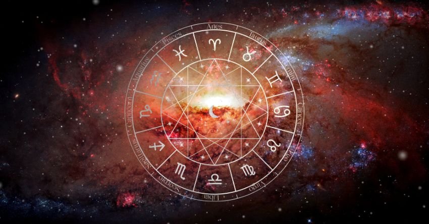 Glowing orange zodiac wheel surrounded by fiery red and dark cosmic clouds