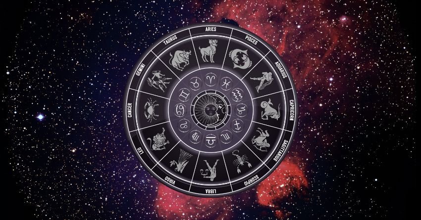 Silver zodiac wheel surrounded by dark purple and red cosmic energy against a celestial background