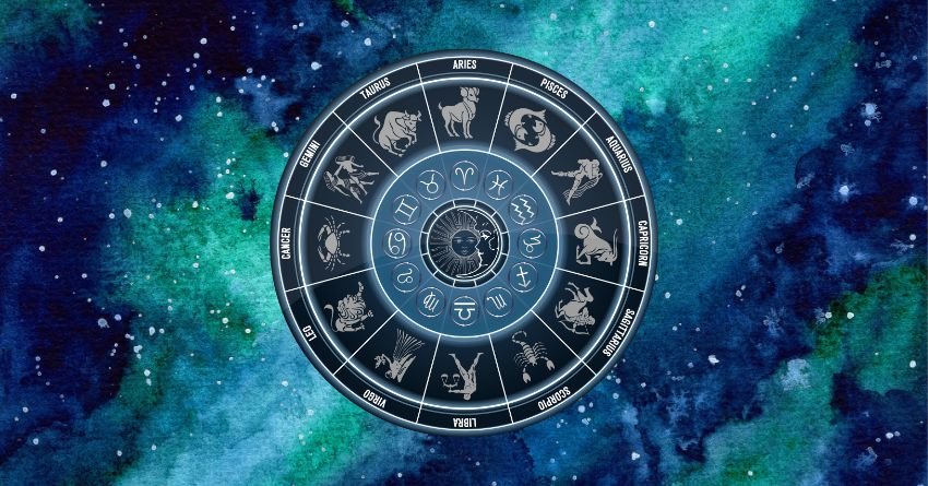 Blue zodiac wheel surrounded by glowing turquoise and dark blue cosmic clouds