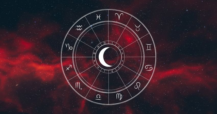 Silver zodiac wheel surrounded by swirling red and black cosmic clouds
