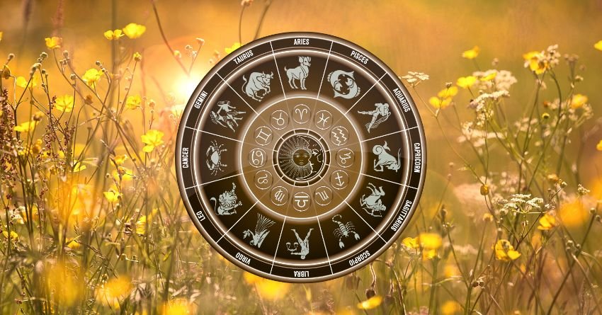 Zodiac wheel with all twelve zodiac signs on a dark circular background