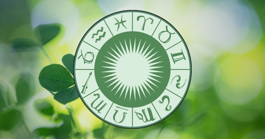 Light green zodiac wheel surrounded by nature