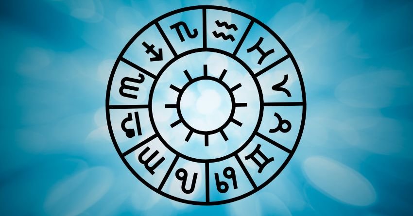 White zodiac wheel on a light blue sky-like background with a soft glowing effect