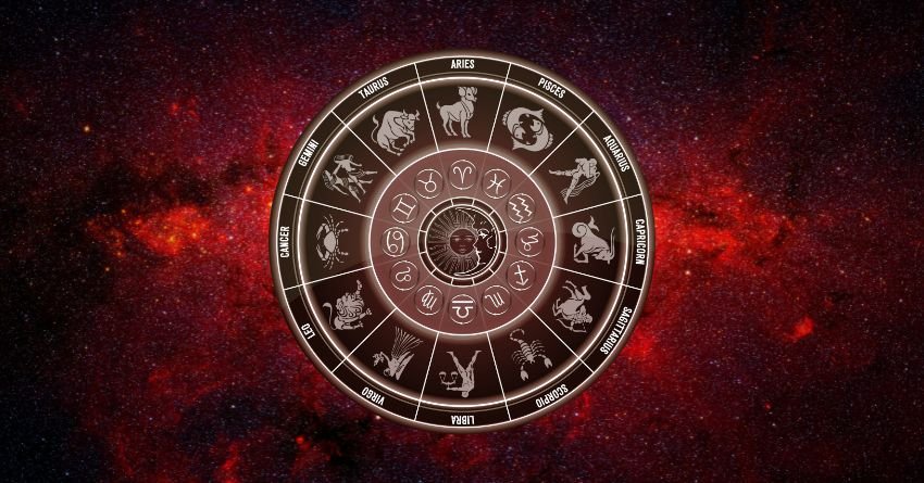 Glowing red zodiac wheel surrounded by dark crimson clouds and fiery cosmic energy